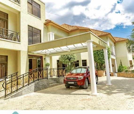 Elevate Suites entrance with carport